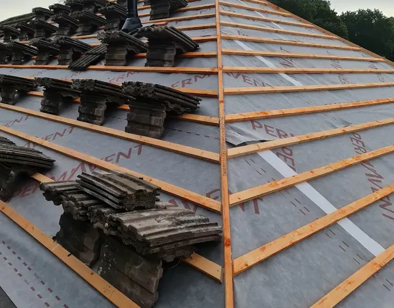 A photo showing a complete re-roof process