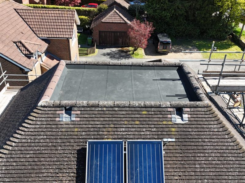 A photo showing one of the completed flat roof installations.